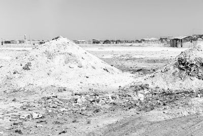 Panoramic shot of field against clear sky