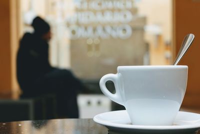 Coffee cup on table