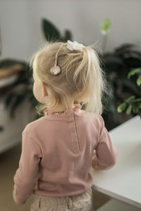 Rear view of girl looking away