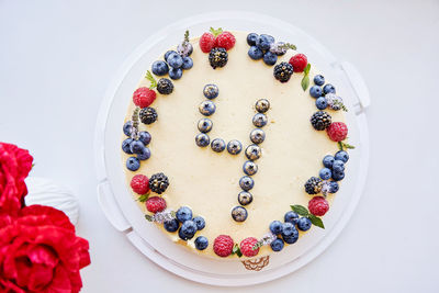 Directly above shot of food in plate on white background