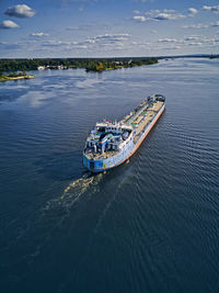 High angle view of ship sailing in sea against sky