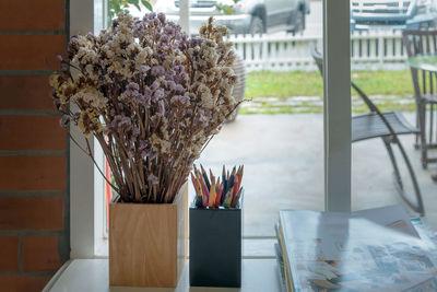 Close-up of flower vase on table