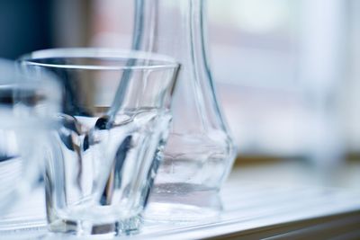 Close-up of glasses on table