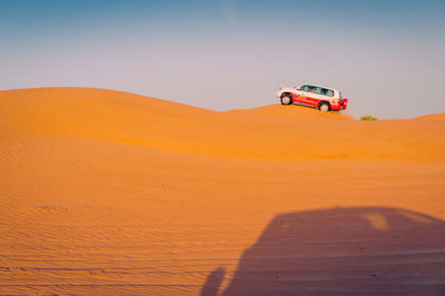 Scenic view of desert against sky