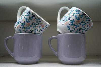 Close-up of coffee cup on table