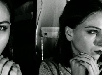 Close-up portrait of young man looking away