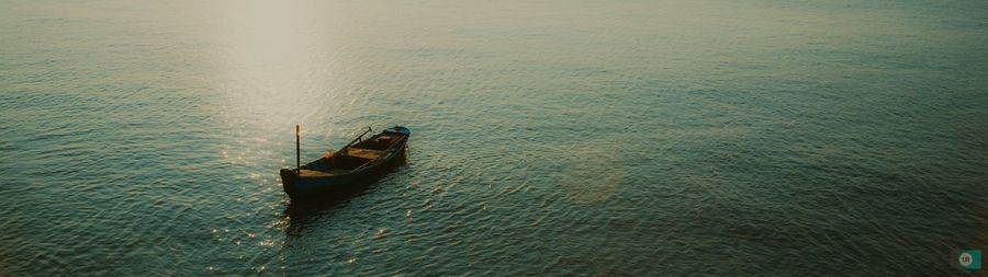 Boats sailing in sea