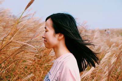 Woman standing on field