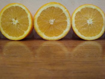 Close-up of oranges on table