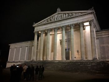 Low angle view of historical building at night