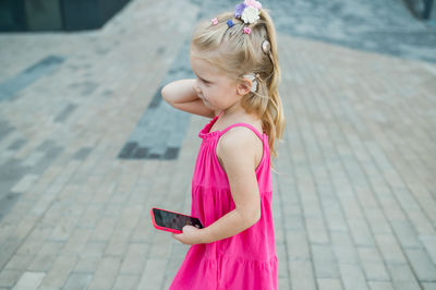 Young woman using mobile phone