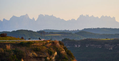 Scenic view of mountains against clear sky