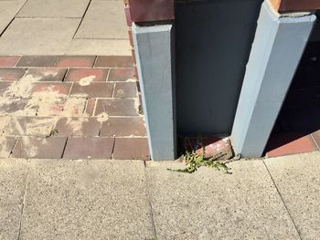 Low section of stone on footpath