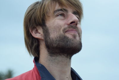 Close-up of man against clear sky