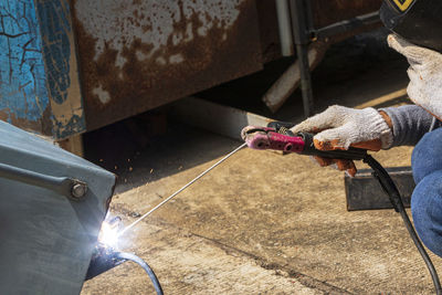 Welder working on a factory