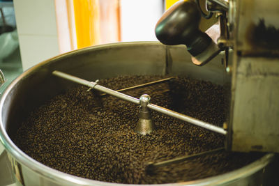 High angle view of coffee beans in machinery