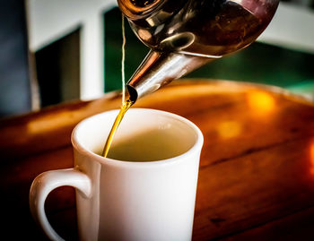 Close-up of coffee cup on table