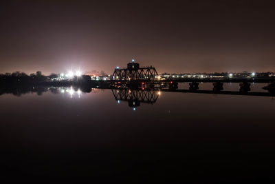 View of illuminated bridge at night