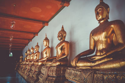 Low angle view of statue against building