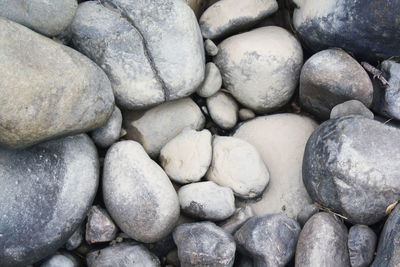 Full frame shot of pebbles at beach