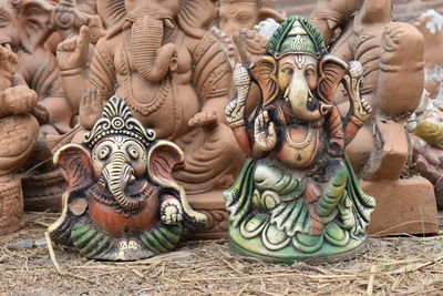 Close-up of ganesha statues