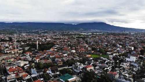 High angle shot of townscape against sky