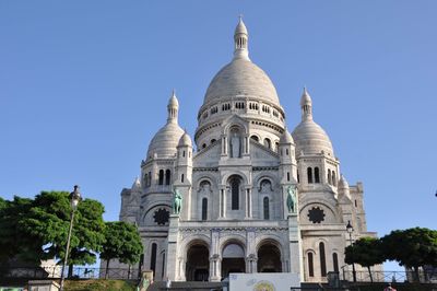 Low angle view of a building basilica sacre coeur in montmartre in paris, france