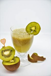 Close-up of drink against white background