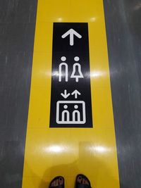 Close-up of arrow sign