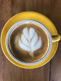 Directly above shot of cappuccino on table