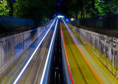 High angle view of light trails at night