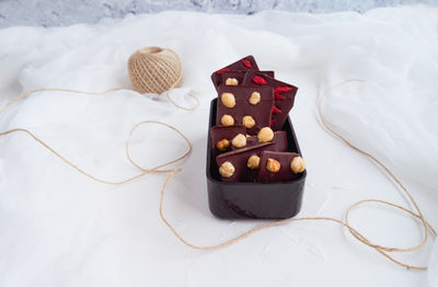 High angle view of chocolate cake on bed