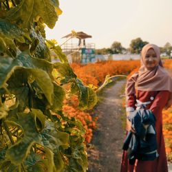 Full length of woman standing on land