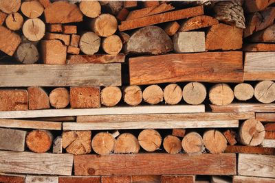 Full frame shot of logs in forest