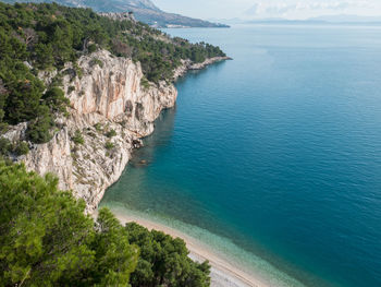 High angle view of sea and mountains