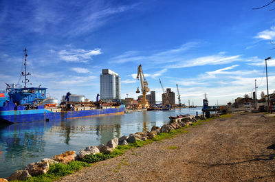 Harbor by sea against sky