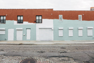 View of residential building with an unfinished paintjob