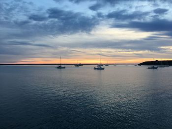 Scenic view of sea against sky at sunset