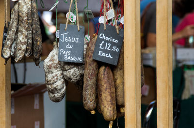 Close-up of hanging sausages in market