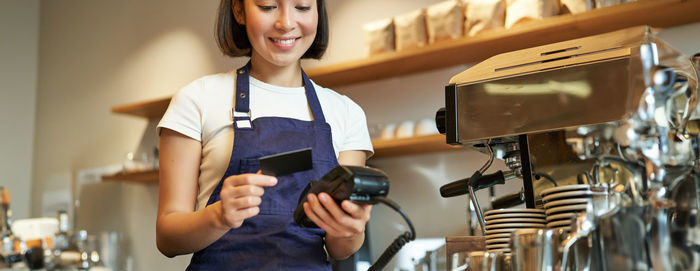 Young woman using mobile phone