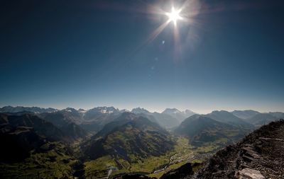 Scenic view of mountains against clear sky