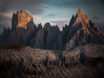 Panoramic view of cadini against sky during sunset