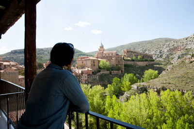 Rear view of man looking at view