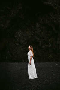 Full length of woman standing on land