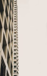 Low angle view of modern building against clear sky