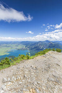 Scenic view of mountains against blue sky