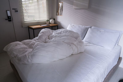 White bed in bedroom