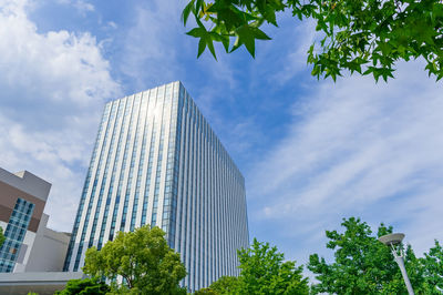 Low angle view of modern buildings against sky