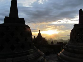 View of temple against sky during sunset