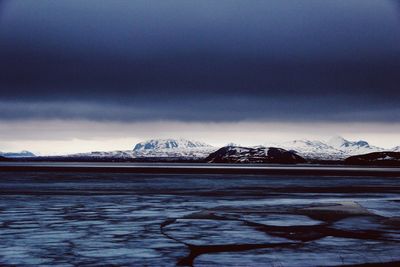 Scenic view of mountains against sky during winter